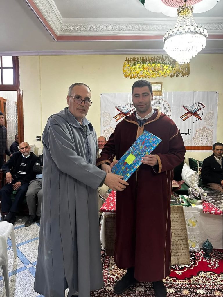 FB_IMG_1743290290227-768x1024 تحكيم مسابقة في حفظ وتجويد القرآن الكريم، مع حفل ختامي.