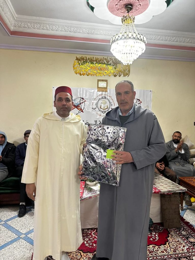 FB_IMG_1743290297029-768x1024 تحكيم مسابقة في حفظ وتجويد القرآن الكريم، مع حفل ختامي.