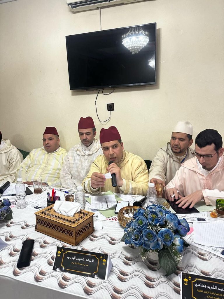 FB_IMG_1743290370456-768x1024 تحكيم مسابقة في حفظ وتجويد القرآن الكريم، مع حفل ختامي.