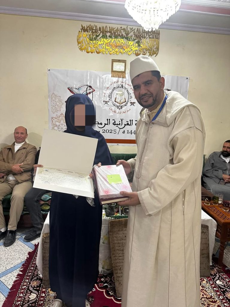 IMG_20250329_234025-768x1024 تحكيم مسابقة في حفظ وتجويد القرآن الكريم، مع حفل ختامي.