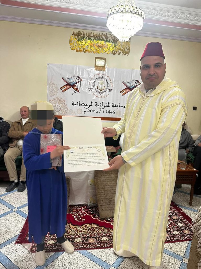 IMG_20250329_234136-768x1024 تحكيم مسابقة في حفظ وتجويد القرآن الكريم، مع حفل ختامي.