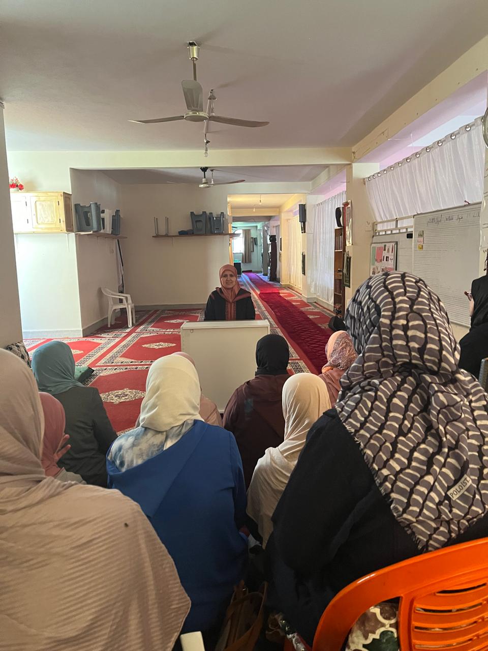 محاضرة بعنوان ” دور المرأة المسلمة في خدمة القرآن الكريم”