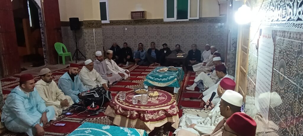 1000324084-1024x462 تقرير عن نشاط علمي في موضوع:" أمسية للمديح و السماع النبوي"