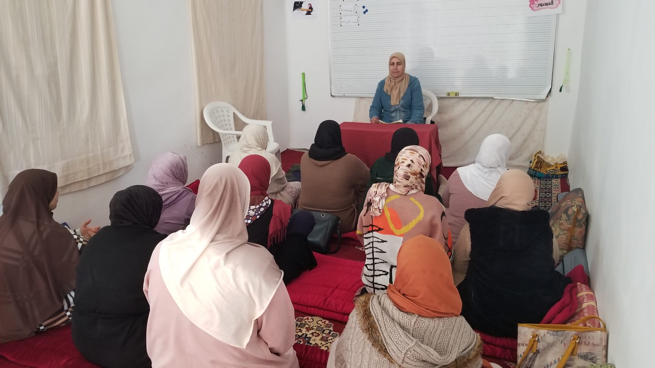 تقرير عن نشاط علمي في موضوع: محاضرة : أثر الصيام في تقوية الإيمان (إعداد: ذة : فاطمة مزوز عضو المجلس العلمي)